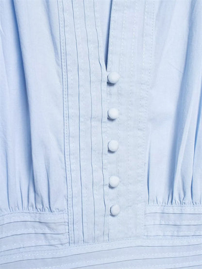 Blouse Plissée à Taille Cintrée